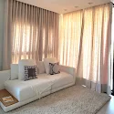 Ambiente — sala com sofá branco